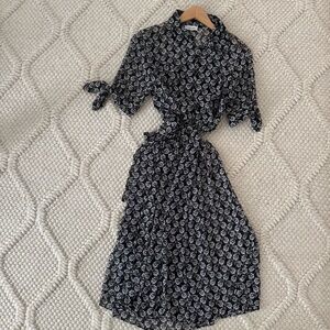 Calvin Klein Floral Black and White Wrap Dress
Size 6